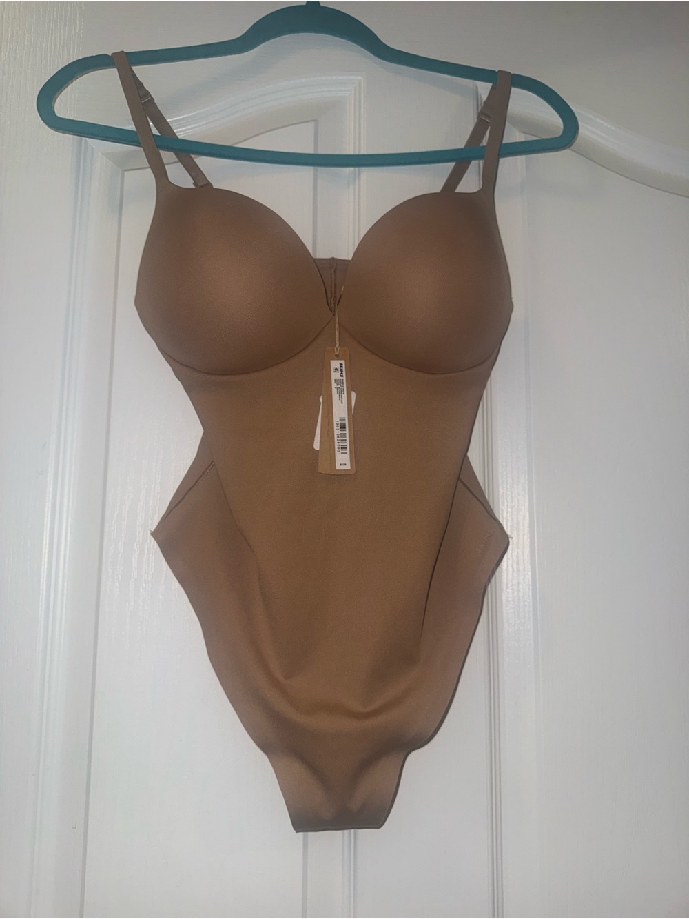 SKIMS Ultimate Thong Bodysuit in Sienna